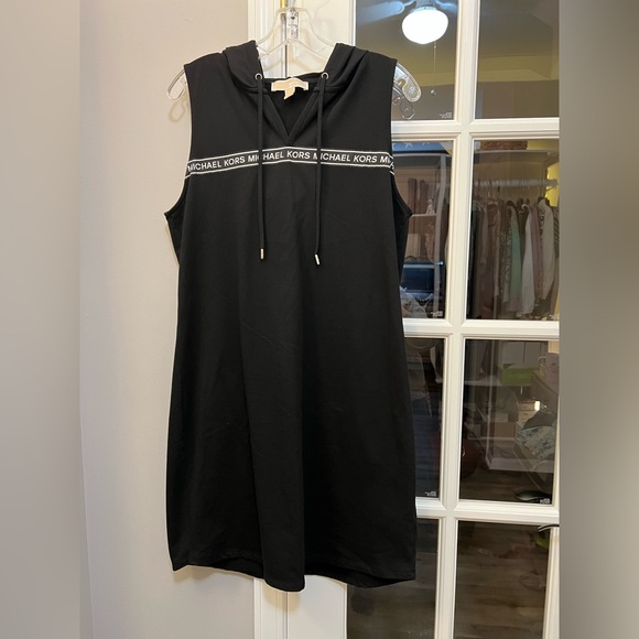 Michael Kors Dresses & Skirts - Michael Kors Black Sleeveless Mini Dress with hood size L EUC